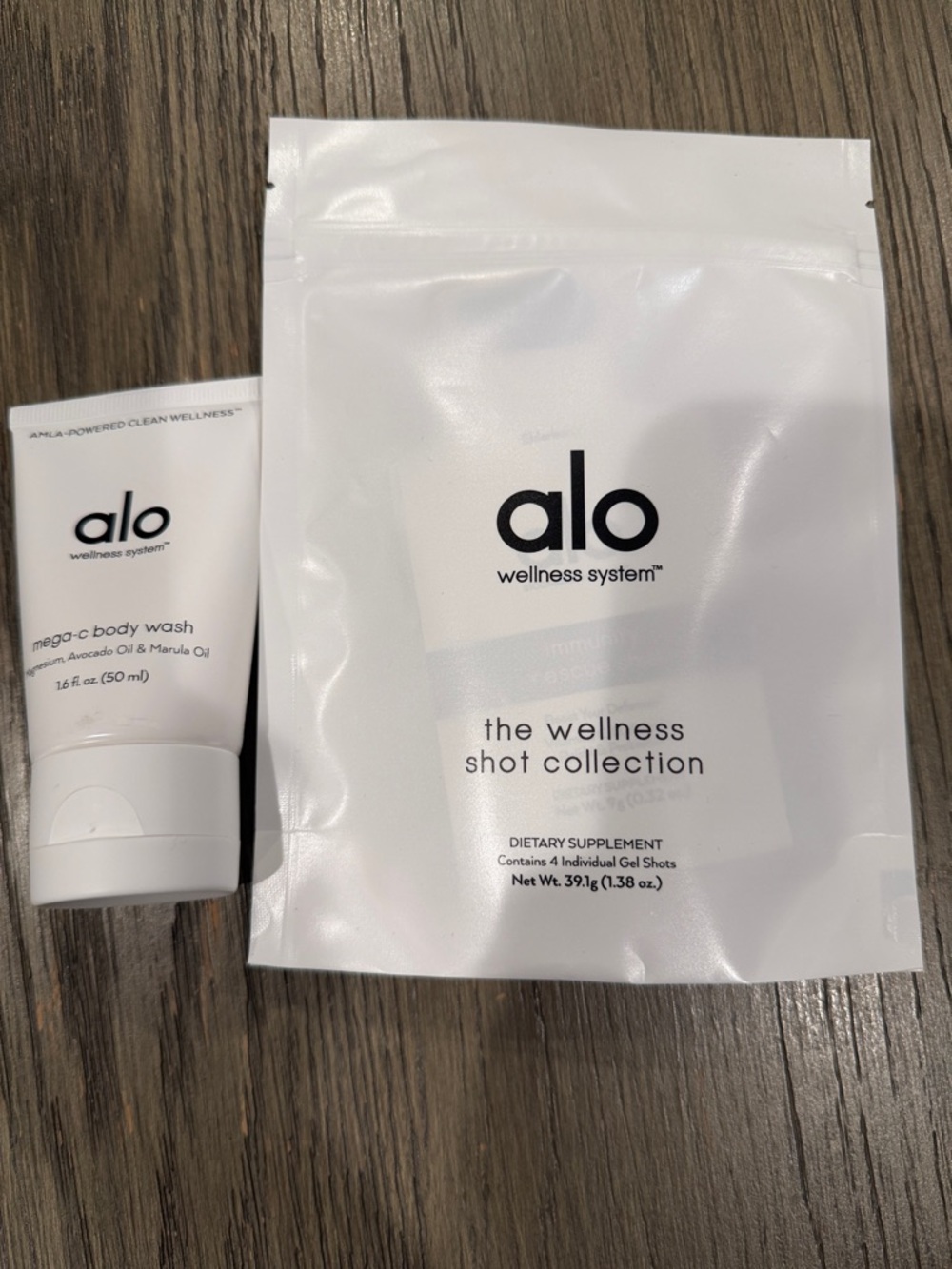 ALO Yoga white wellness shot collection & mega-c body wash